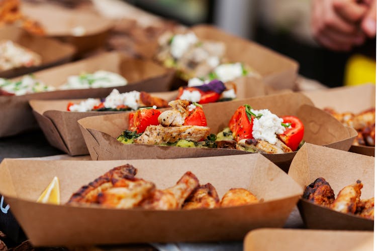 Close-up Of Food In Paper Food Containers 