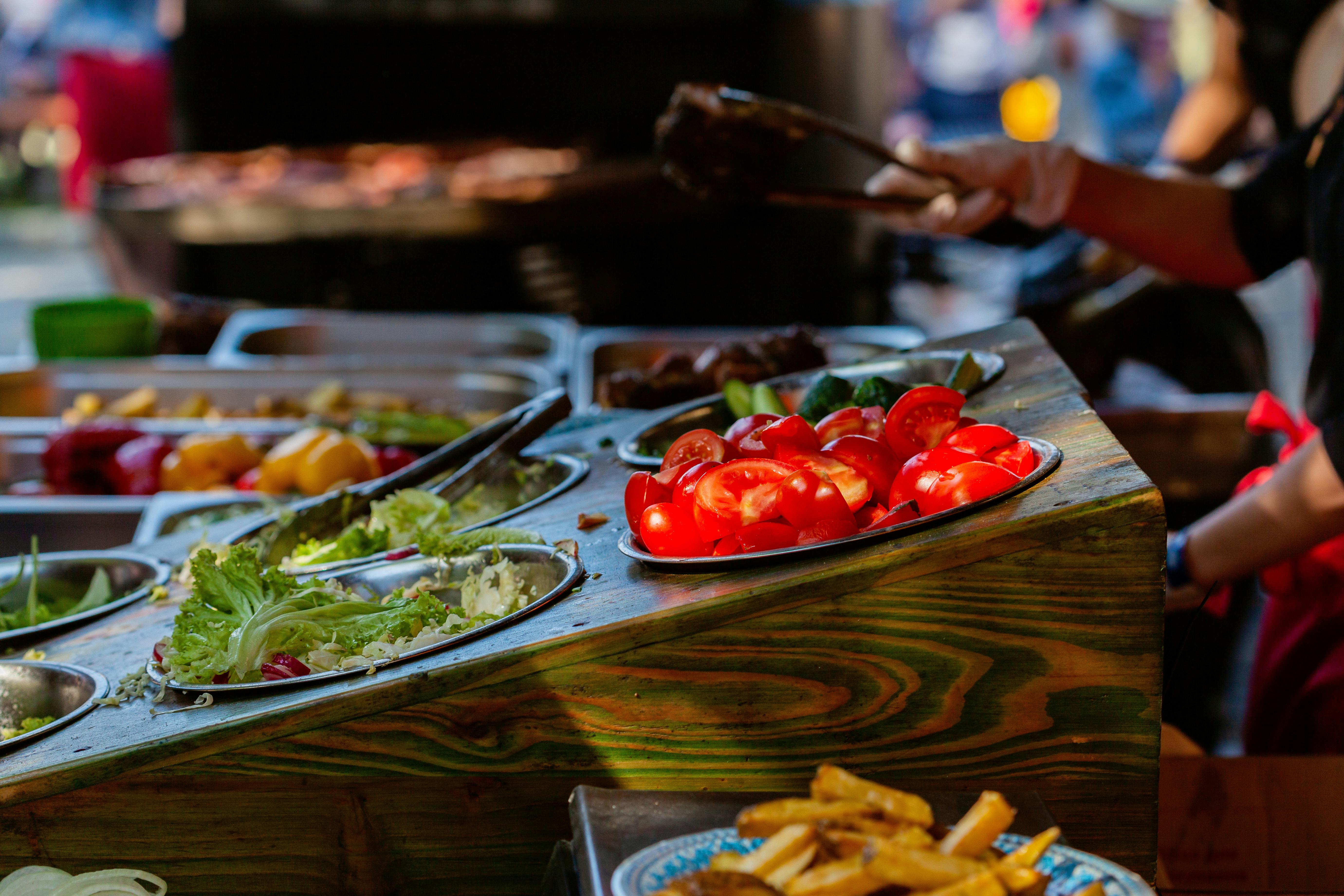 Photo of Tomatoes Near Lettuce · Free Stock Photo