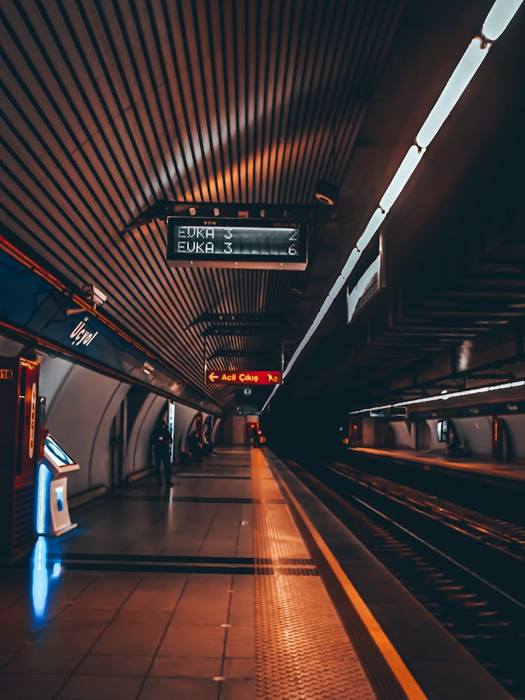 People Waiting Train On Metro Station