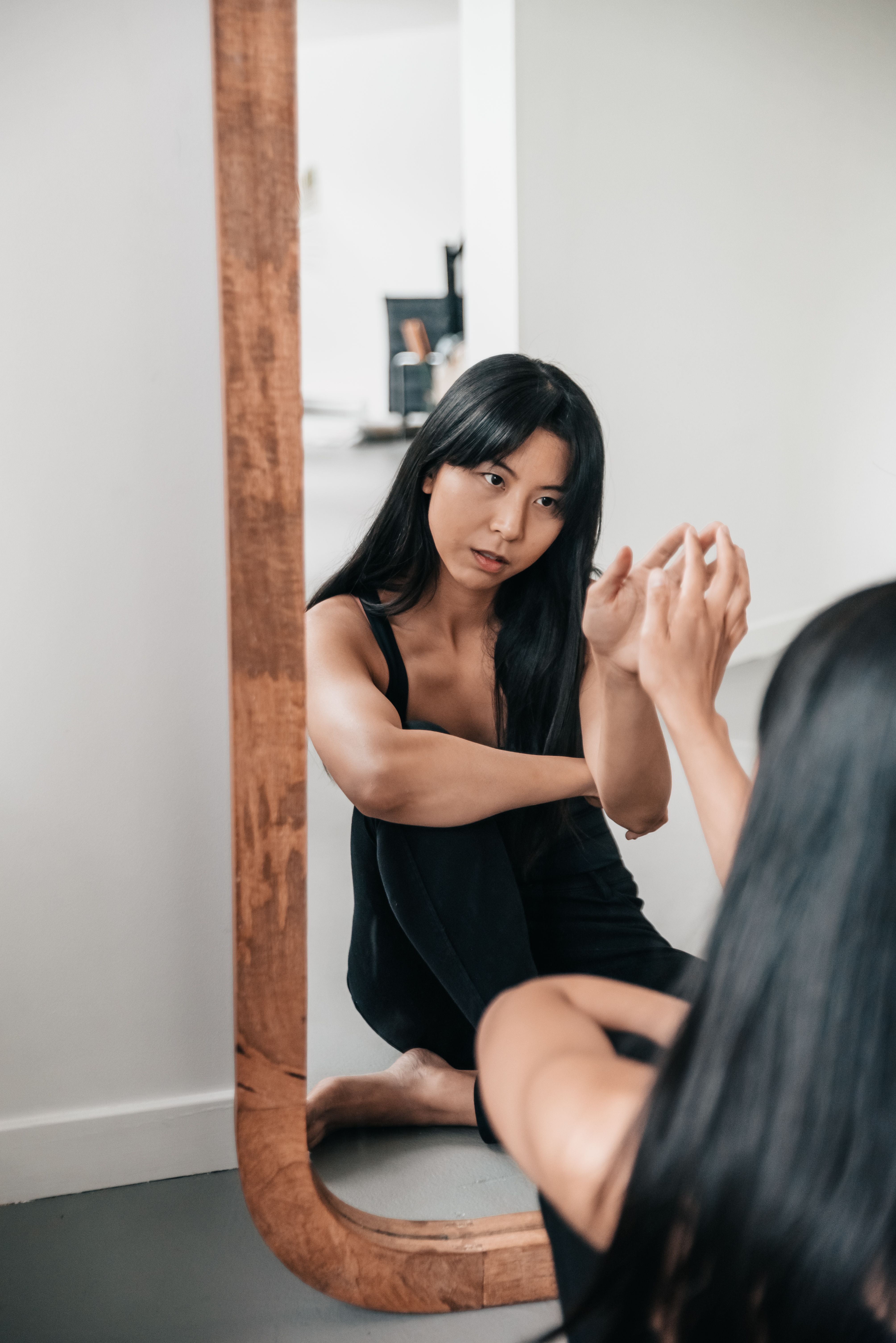 A Woman Touching a Mirror · Free Stock Photo