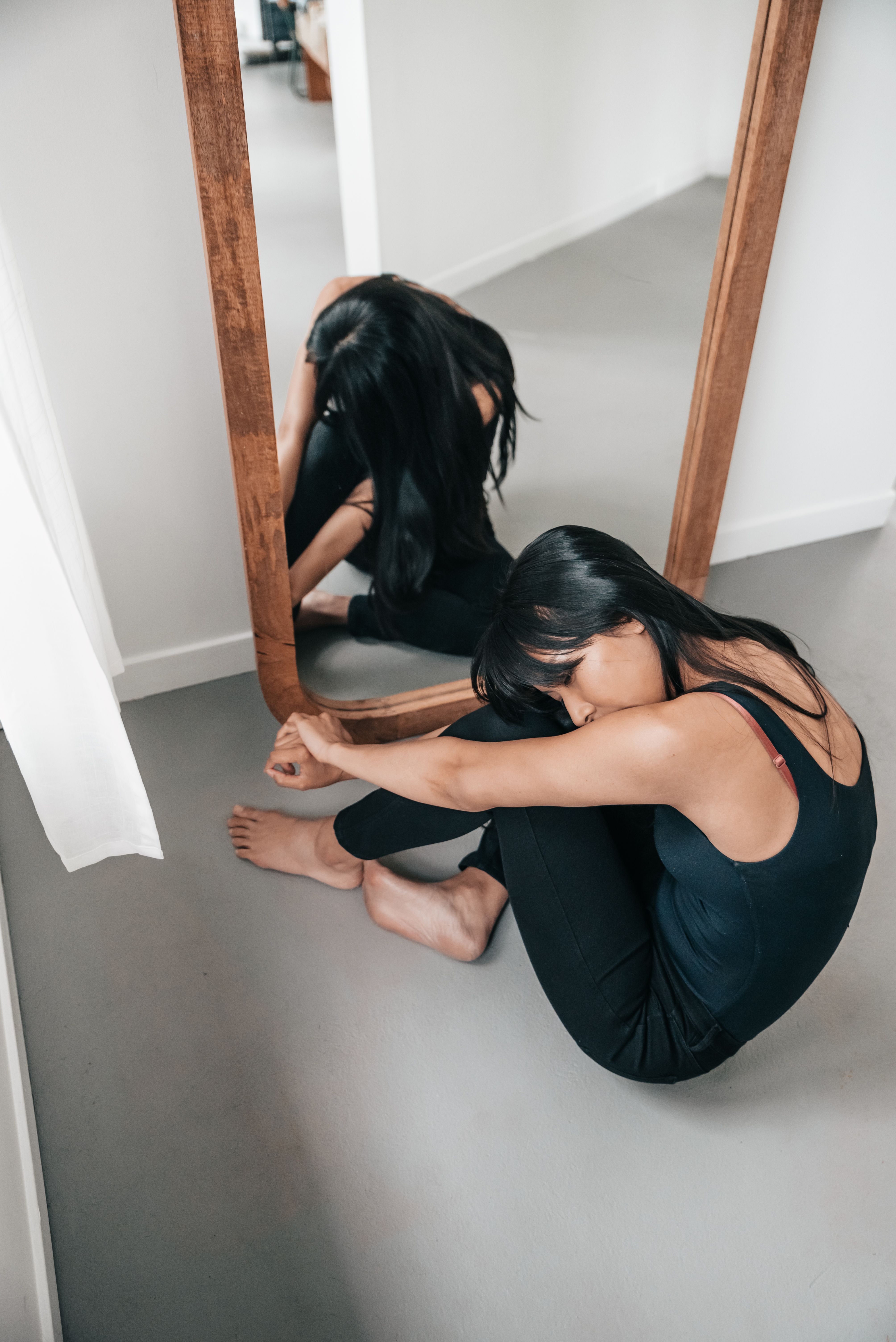 A Woman Touching a Mirror · Free Stock Photo