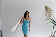 Woman in Blue Spaghetti Strap Dress