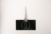 Black and Silver Scissors on Black Box
