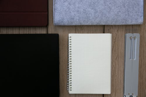 Free Notebook Next to the Ipad Stock Photo