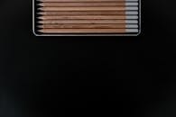 Wooden Pencils on Black Background