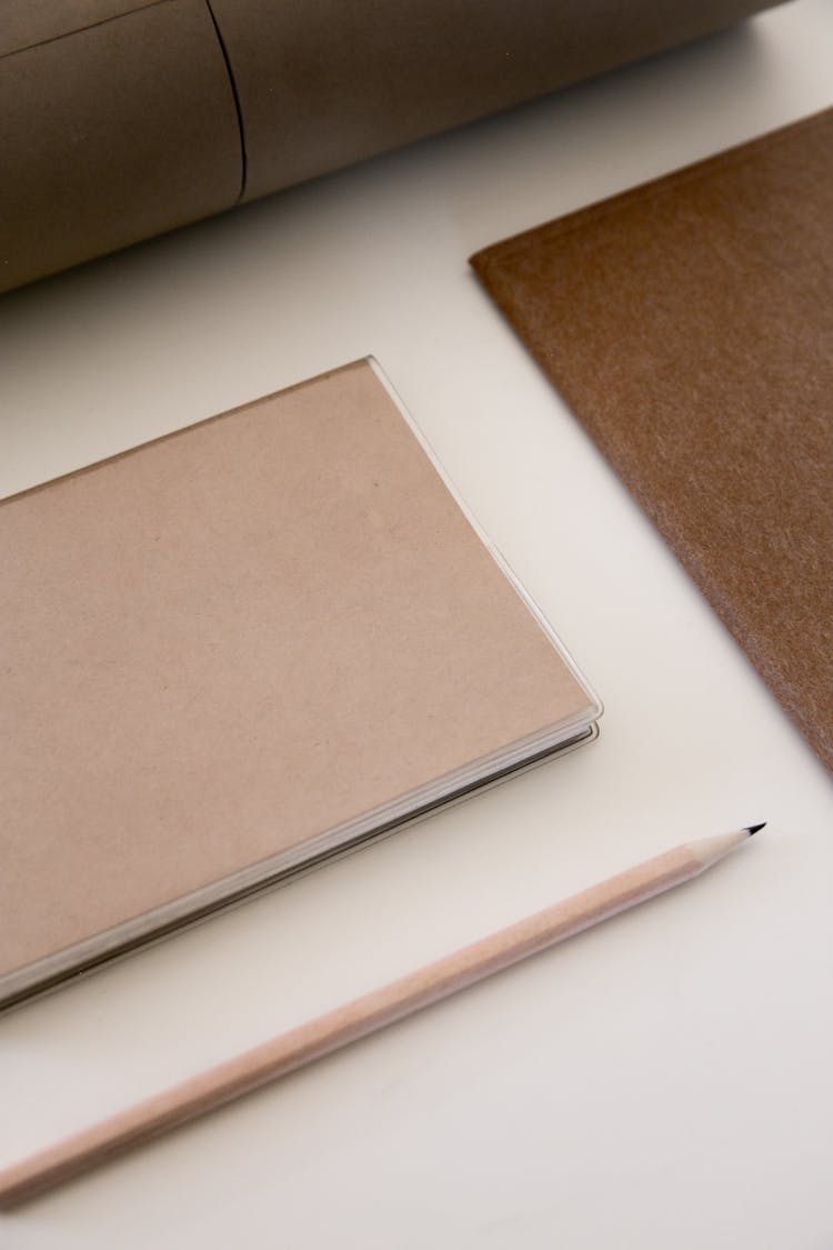 Kraft Papers On White Surface