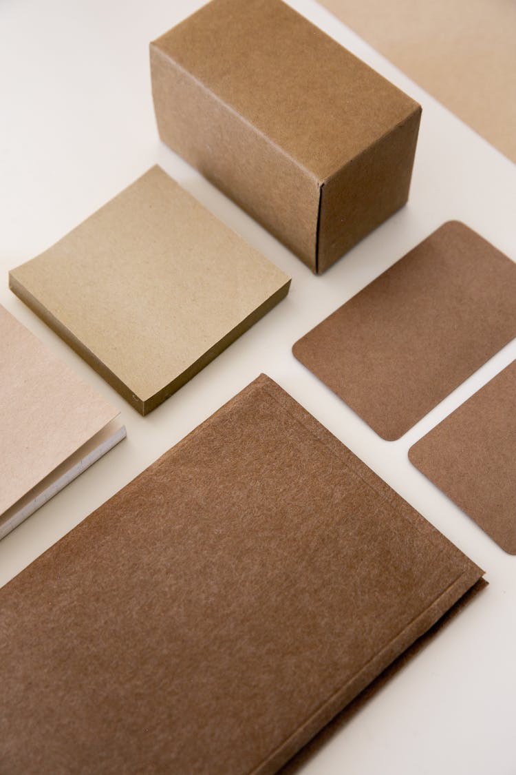 Kraft Papers On White Surface 