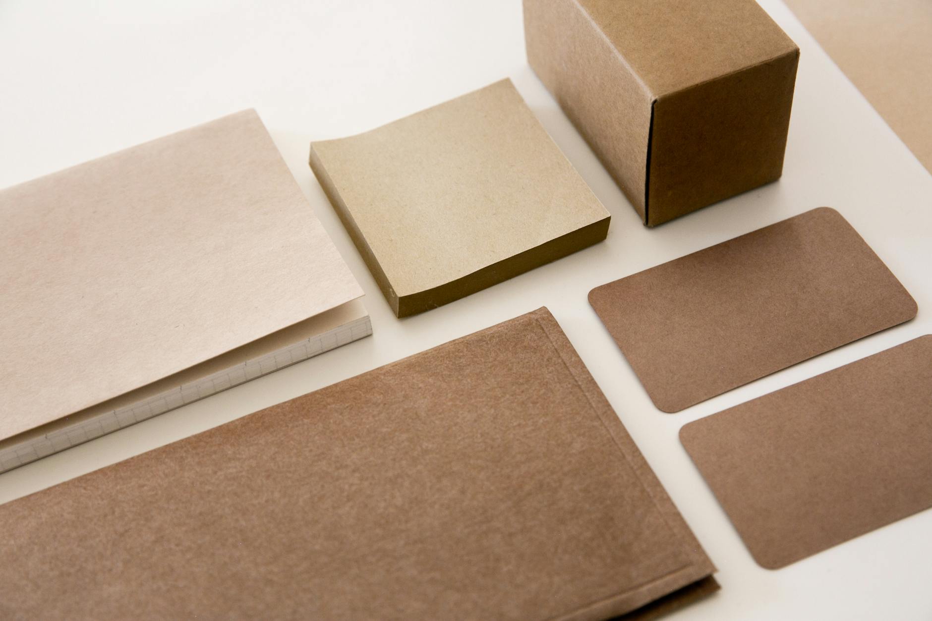 Explore a minimalist arrangement of brown paper stationery, perfect for office and business environments.