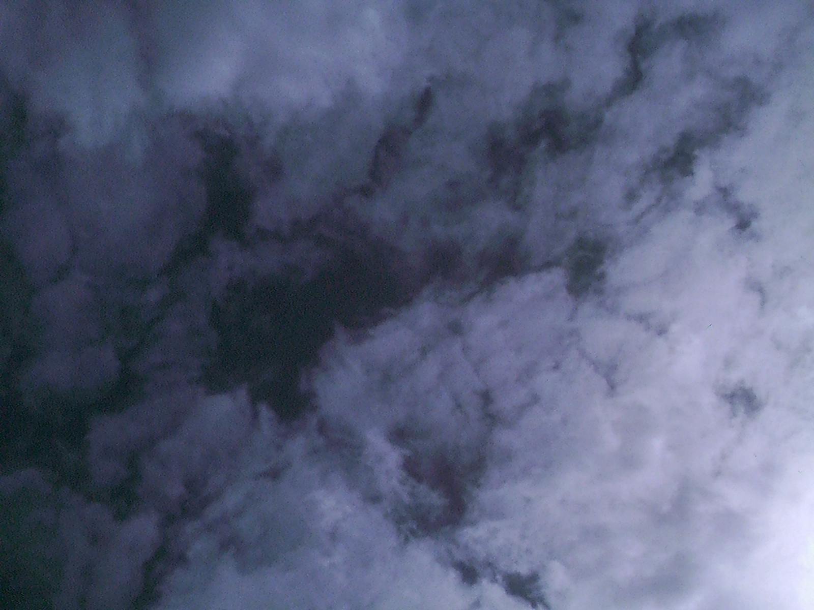 Founder calculating MVP cost on laptop