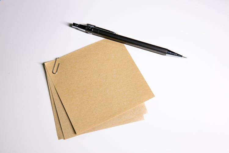 A Mechanical Pencil Near Blank Kraft Paper