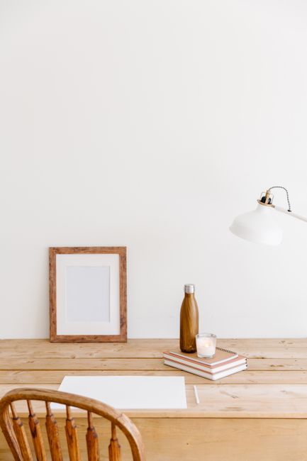 A clean and simple workspace with wooden elements, ideal for minimalistic design.