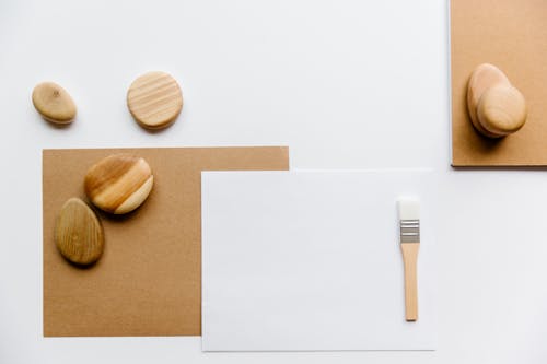 Cardboard, Paper Sheet and Paintbrush