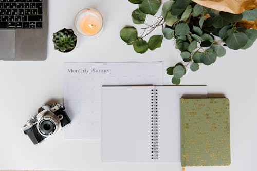 Free Different Items over a White Table Stock Photo