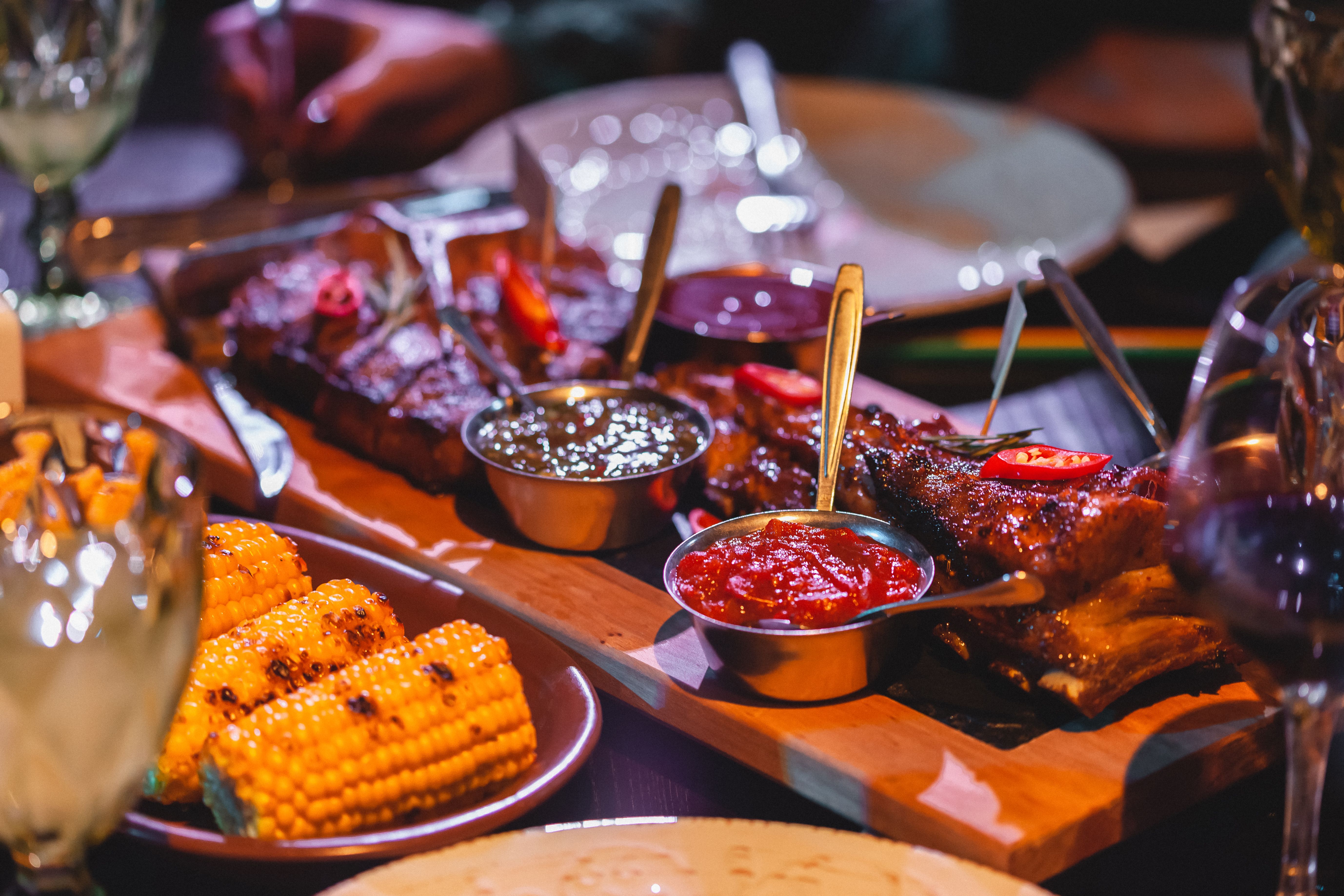 Assortment of popular grocery store barbecue sauces on kitchen counter