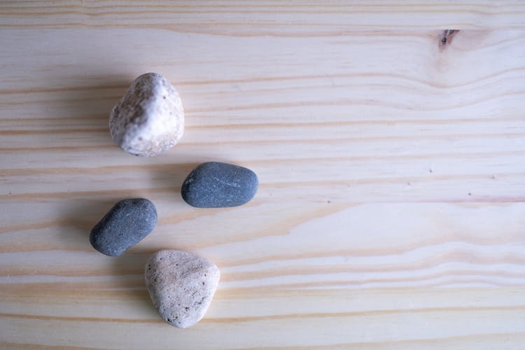 Small Stones On Wood