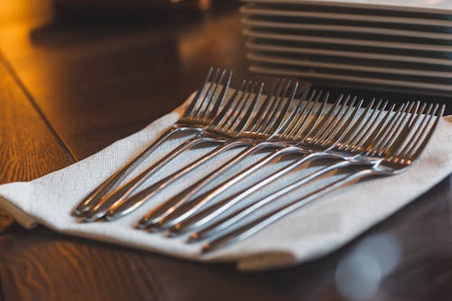 Silver Stainless Forks on the Table