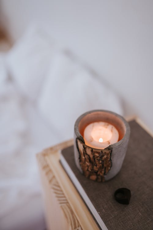 Wax Candle on Book