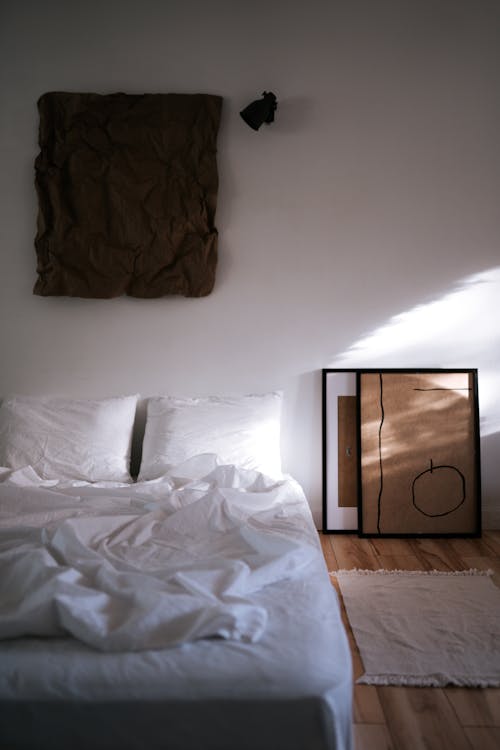 Free An Artwork Hanging on the Bedroom Wall Stock Photo