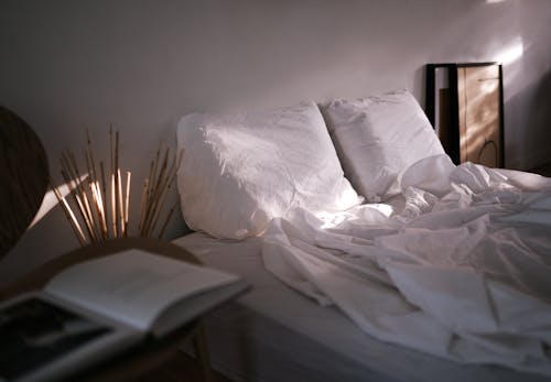 White Bed Linen on Bed
