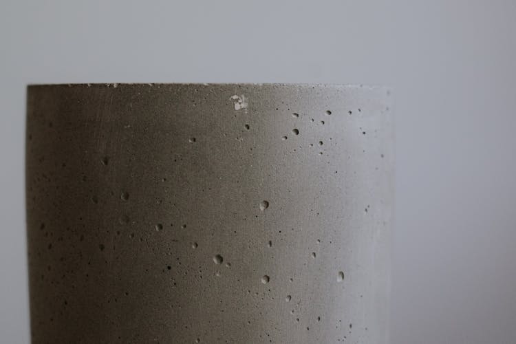 Close-Up Shot Of A Gray Concrete Vase 