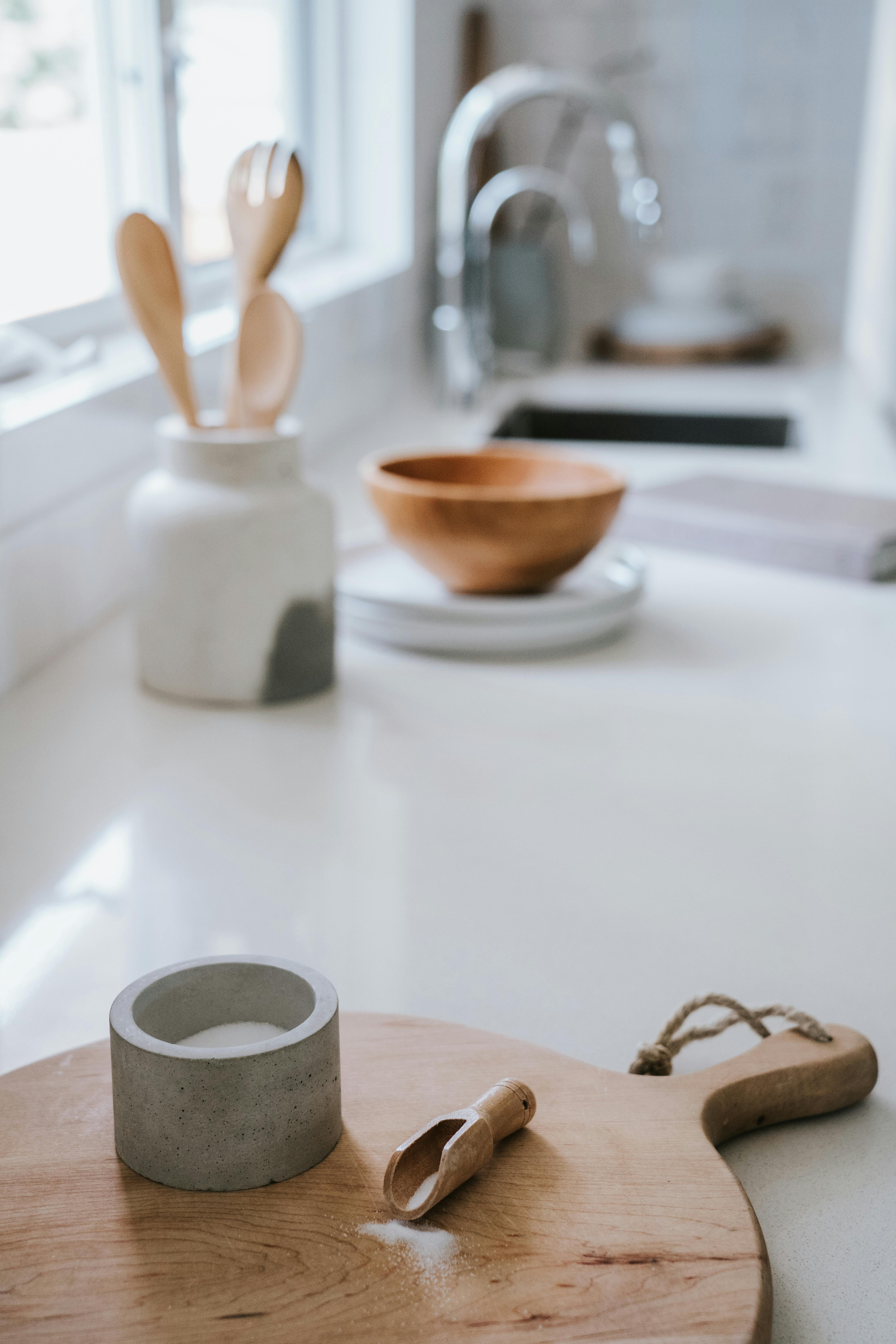 brown wooden chopping board on the table