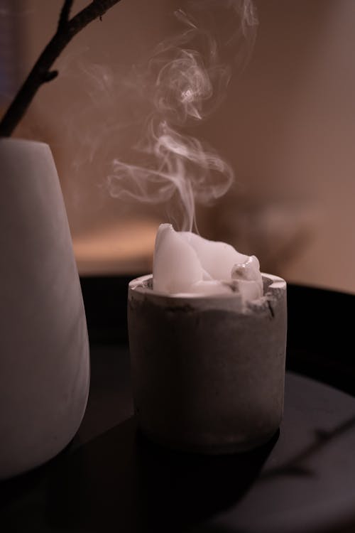 Gray and Beige Image with Smoke from a Candle