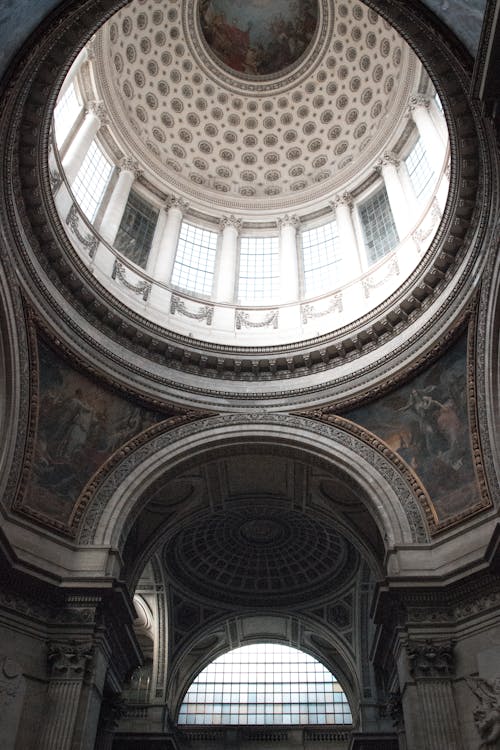 Free Low Angle Photography of Brown and White Concrete Dome Ceiling Stock Photo