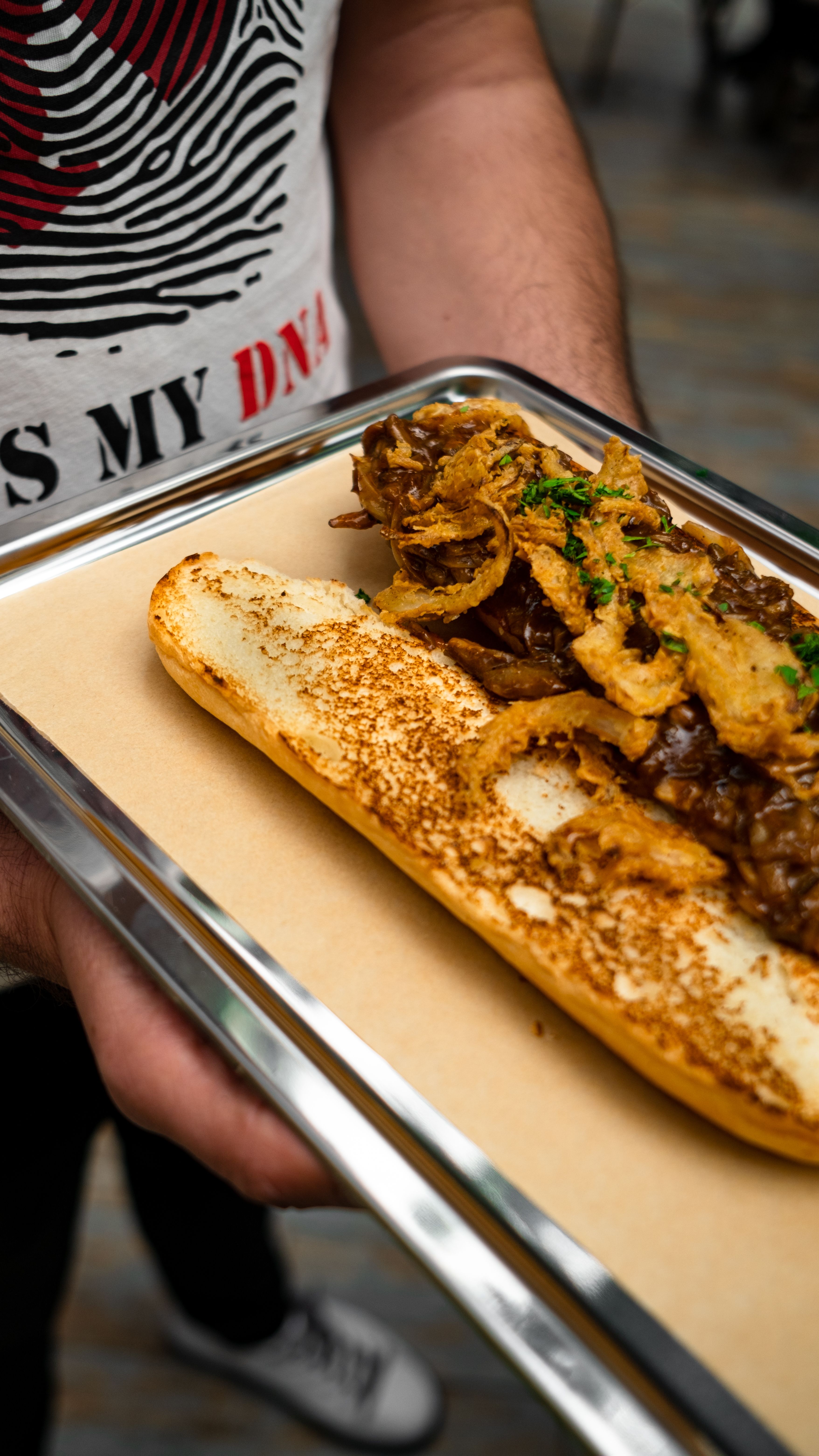 person-holding-italian-beef-sandwich.