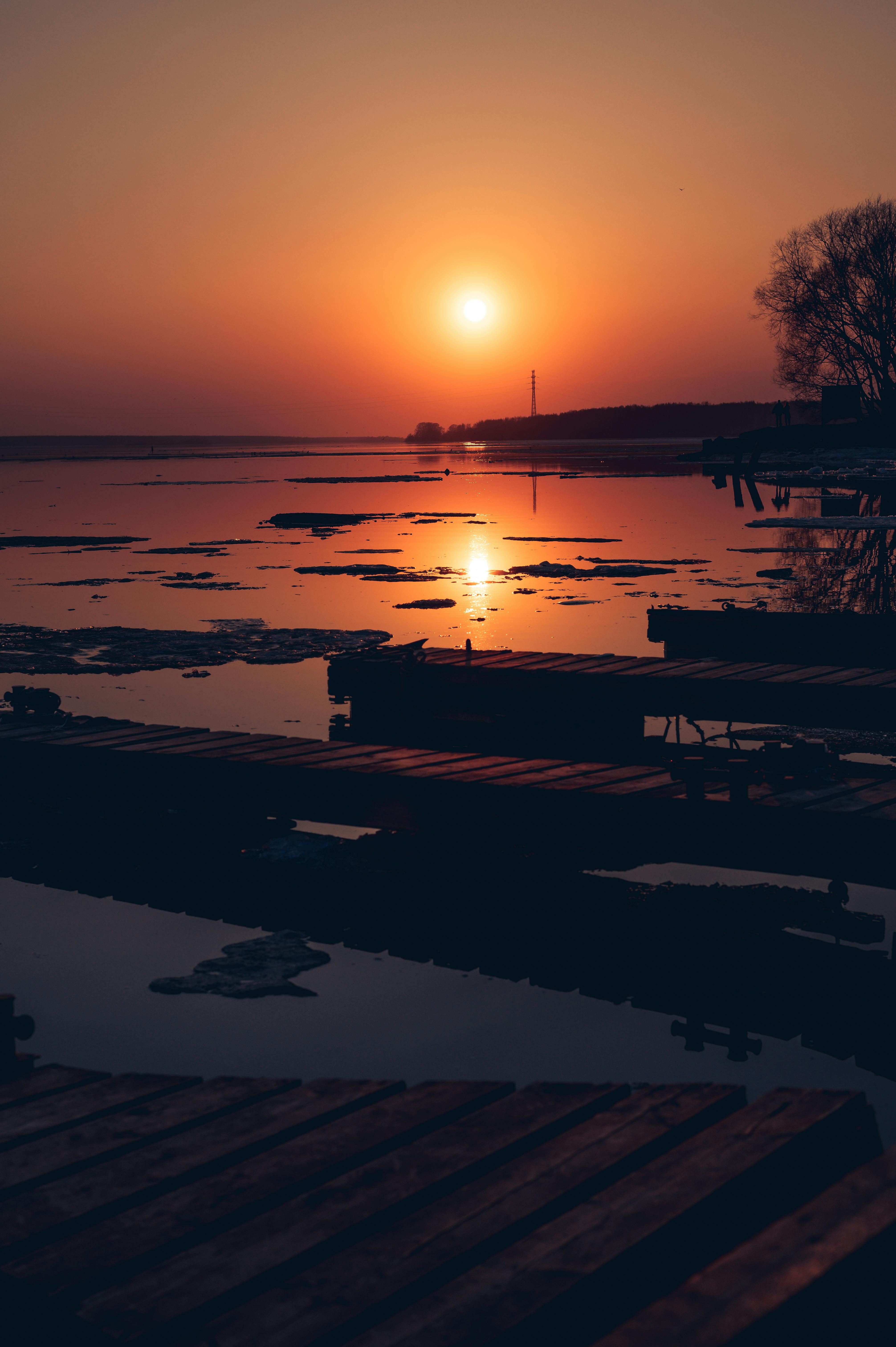 wooden deck during sunset