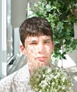 Man in White Floral Shirt