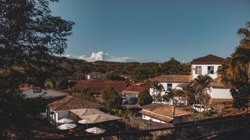 Free A scenic view of Tiradentes, Brazil showcasing classic colonial architecture under a clear blue sky. Stock Photo