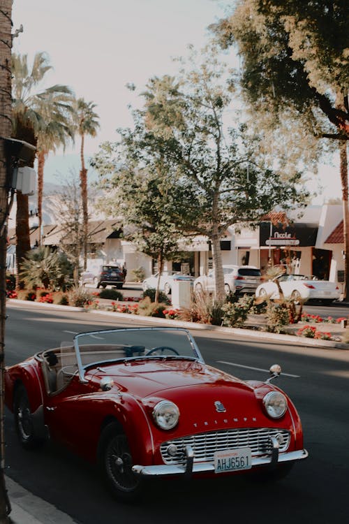 A Triumph TR3 Car Parked on a Road