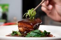 Brown Cooked Meat and Green Vegetable on White Ceramic Plate