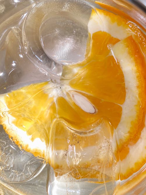 Sliced Lemon in Water with Ice