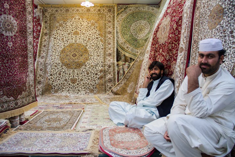 Men With Beards Sitting And Smiling