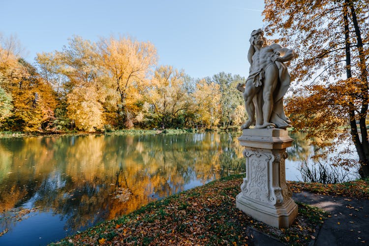 Sculptures And A Lake In The King John III Palace Museum, Wilanow, Warsaw, Poland 