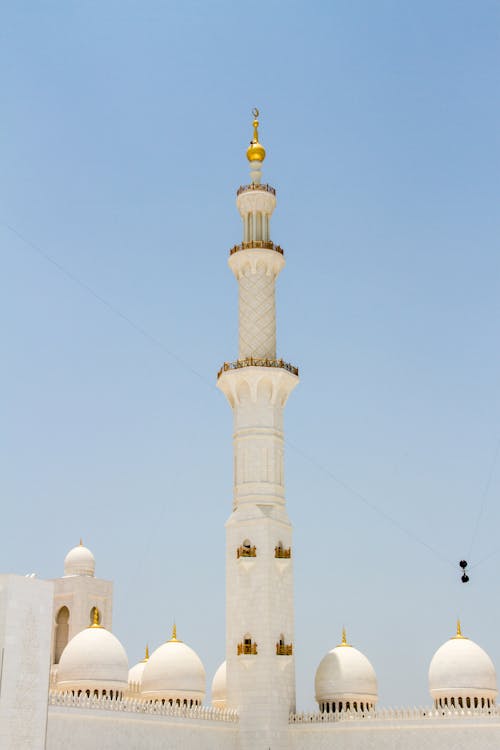 White Concrete Tower Under Blue Sky