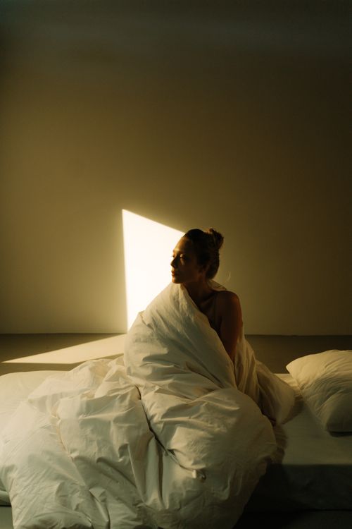 Morning bedroom editorial in warm light &mdash; photo by Ron Lach on Pexels