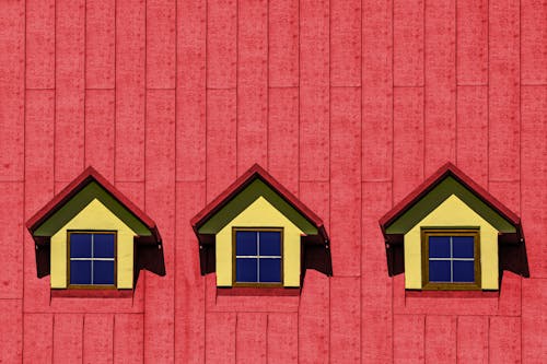 Symmetrical Roof Windows in a Red Roof 