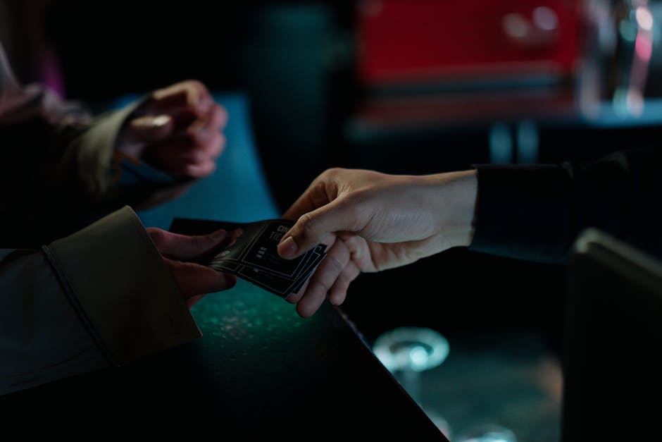 Person Handing a Cinema Tickets