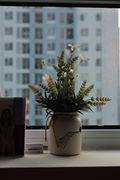 Flowers in a white vase by HONG SON on Pexels