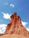 Brown Rock Formation Under Blue Sky and White Clouds
