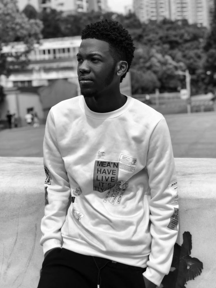 Black And White Shot Of Man In White Longsleeve Standing 