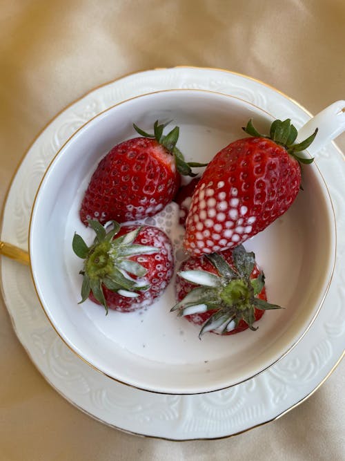 Free Strawberries in a Cup of Milk  Stock Photo