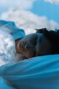 Woman Lying on White Textile