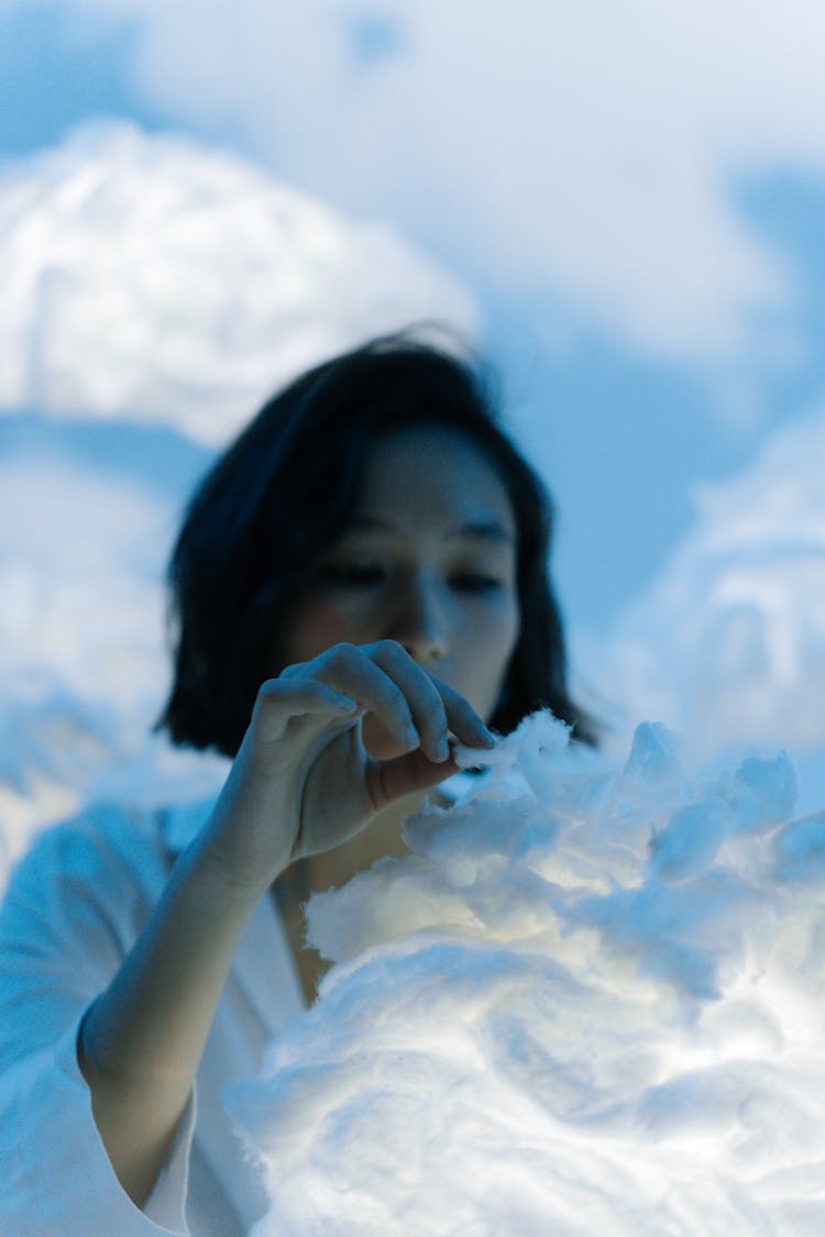 Woman Among Clouds