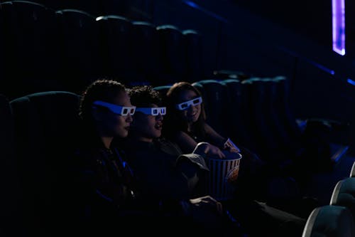 Free Friends Watching a Movie Stock Photo