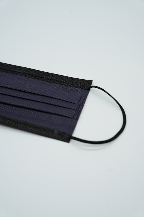 Close-Up Photo of a Black Surgical Mask