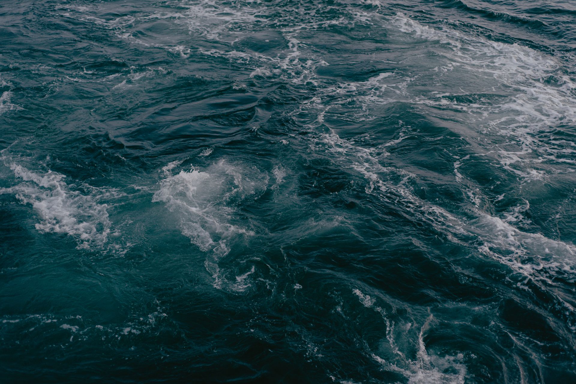 Dynamic view of ocean waves with captivating textures and movement.
