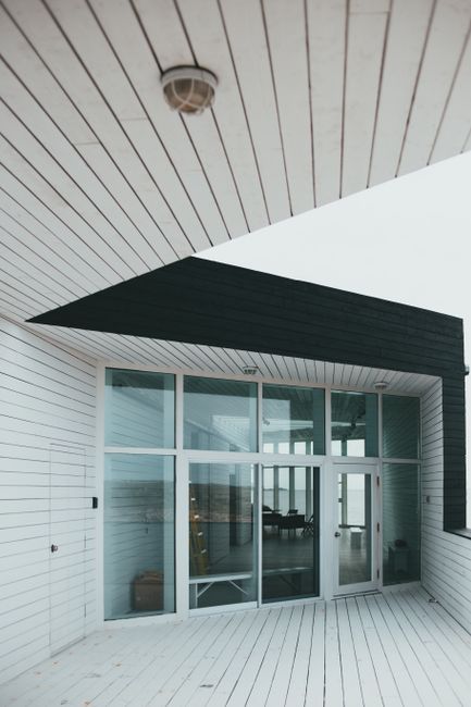 Elegant modern architectural design showcasing a glass facade entrance.